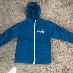 Children place boys windbreaker jacket.Size S